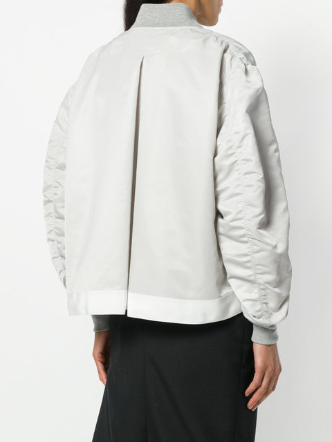 Make a Statement This Fall with a Sacai Bomber Jacket featuring Betsy Brown of popular high end fashion blog, A Few Goody Gumdrops