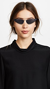 Designer Sunglasses for Fall featured by top high end fashion blog, A Few Goody Gumdrops