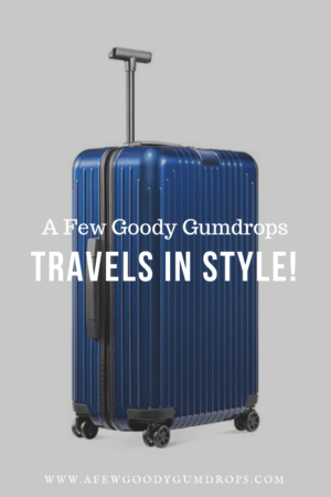 A Few Goody Gumdrops Travels In Style  | Chic luggage featured by top high end life and style blog, A Few Goody Gumdrops: image of a blue Rimowa trolley luggage  