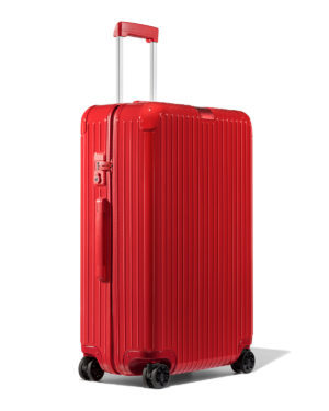  | Chic luggage featured by top high end life and style blog, A Few Goody Gumdrops: image of a red Rimowa trolley luggage  