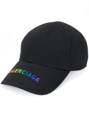 Trendy designer baseball caps featured by top US fashion blog, A Few Goody Gumdrops: image of a woman wearing a Balenciaga baseball cap