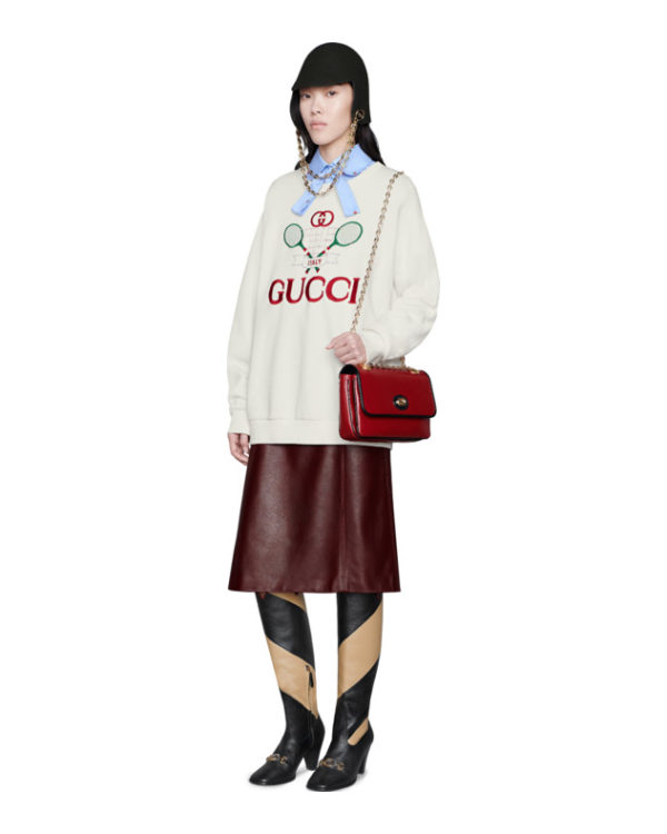 High end fashion blogger, A Few Goody Gumdrops shares her obsession for designer logo sweatshirts: image of a Gucci sweatshirt