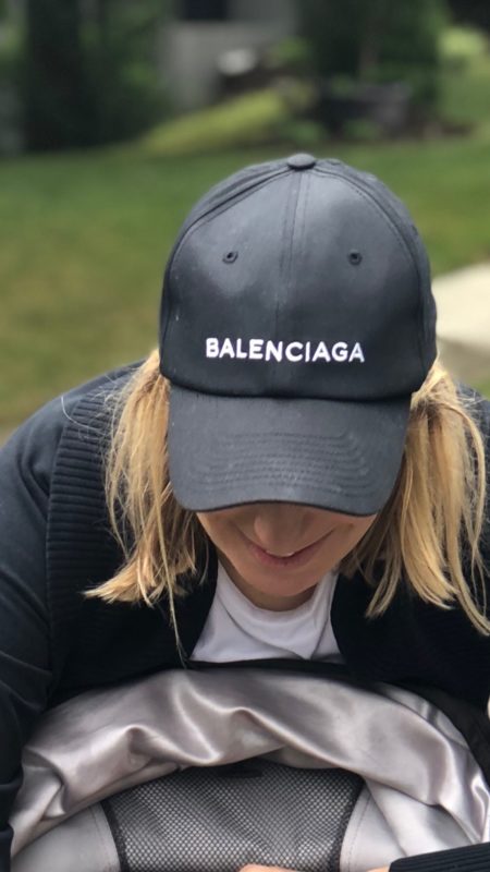 Trendy designer baseball caps featured by top US fashion blog, A Few Goody Gumdrops: image of a woman wearing a Balenciaga baseball cap