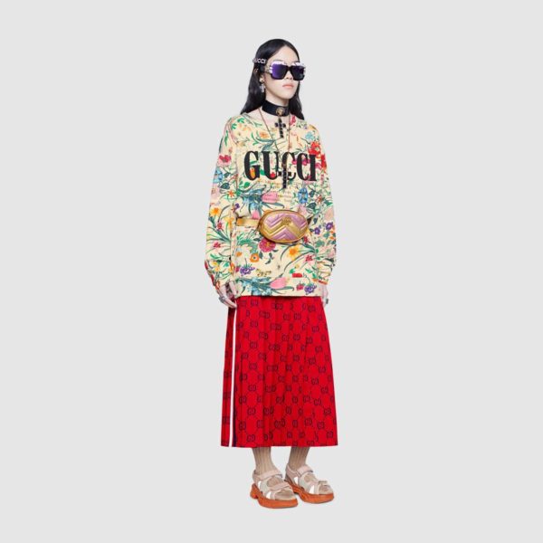 High end fashion blogger, A Few Goody Gumdrops shares her obsession for designer logo sweatshirts: image of a floral Gucci sweatshirt