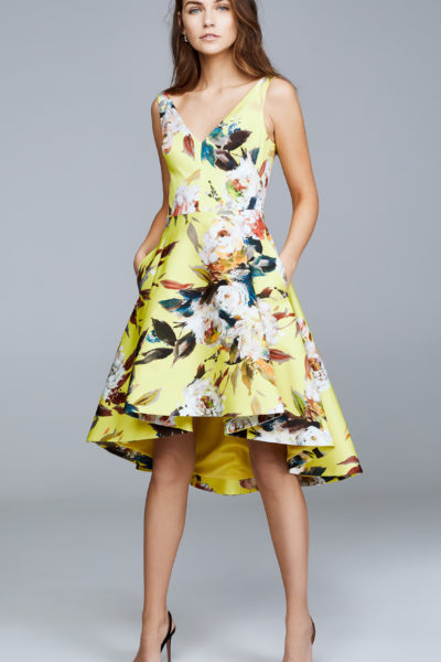 Yellow floral Spring trend featured by top high end fashion blog, A Few Goody Gumdrops: image of a woman wearing a Black Halo yellow floral dress