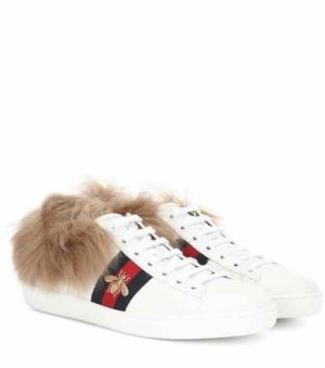 The White Sneaker Trend reviewed by top US high end fashion blog, A Few Goody Gumdrops: image of Gucci bee white sneakers