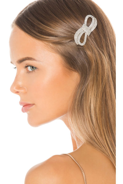 Trendy Hair Clips and Barrettes featured by top US high end fashion blog, A Few Goody Gumdrops: image of a woman wearing a Jennifer Behr glitzy barrette