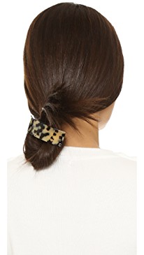 Trendy Hair Clips and Barrettes featured by top US high end fashion blog, A Few Goody Gumdrops: image of a woman wearing an Alexandre de Paris thick hair clip