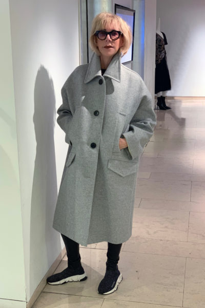 Cocoon winter coat shopping guide featured by top US high end fashion blog, A Few Goody Gumdrops: image of a woman wearing Givenchy cocoon winter coat