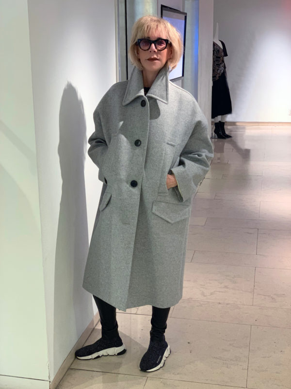 Cocoon winter coat shopping guide featured by top US high end fashion blog, A Few Goody Gumdrops: image of a woman wearing Givenchy cocoon winter coat