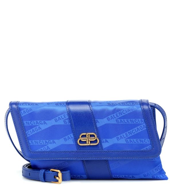 Blue fashion trend favorites featured by top US high end fashion blog, A Few Goody Gumdrops: image of a blue Balenciaga shoulder bag.