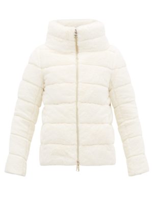 Designer ski jackets featured by top US high end fashion blog, A Few Goody Gumdrops.