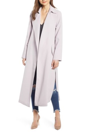 Light raincoats featured by top US high end fashion blog, A Few Goody Gumdrops: image of Kendell and Kylie split trench raincoat