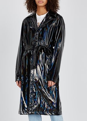 Light raincoats featured by top US high end fashion blog, A Few Goody Gumdrops: image of Rains holographic raincoat