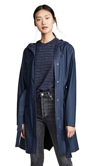 Light raincoats featured by top US high end fashion blog, A Few Goody Gumdrops: image of Rains Curve Jacket